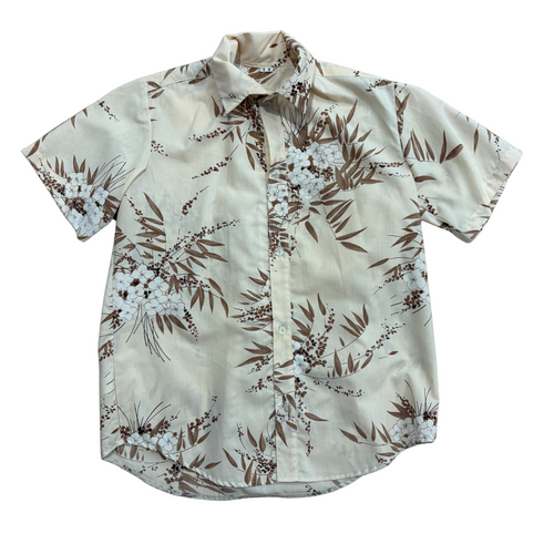 Beige shirt with brown floral pattern on a white background