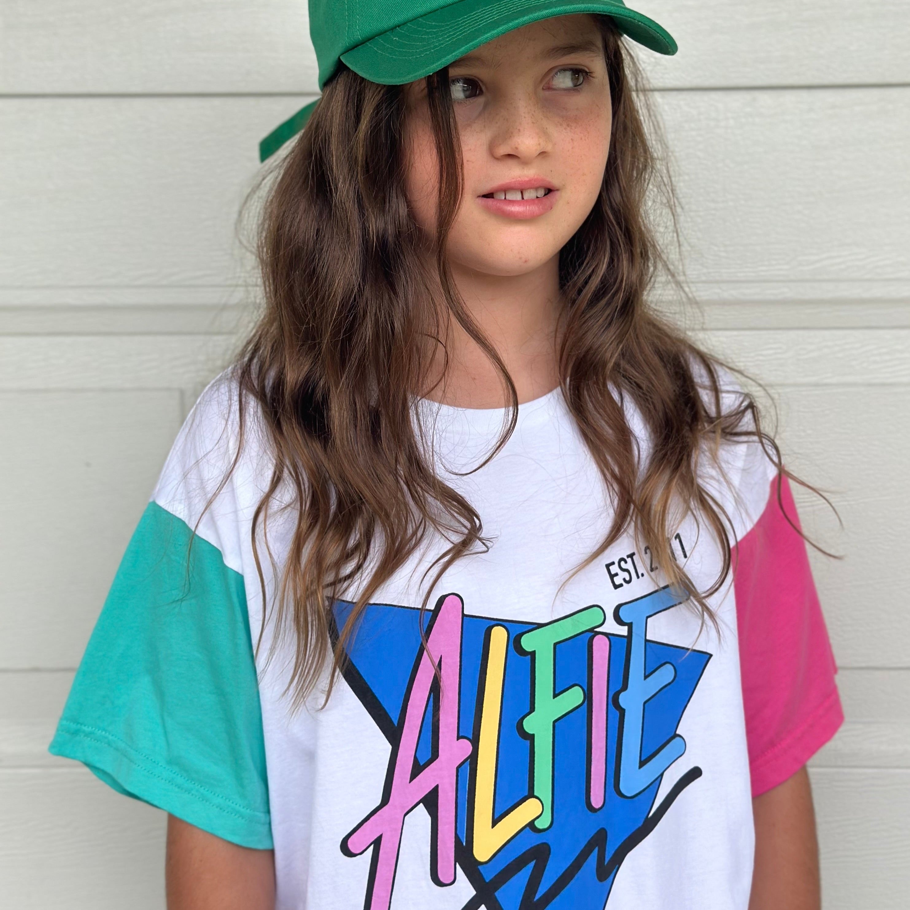 Alfie Bermuda Tee White Kids T-Shirt with Pink and Aqua Sleeves, Large ALFIE logo on front